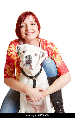 Smiling woman un jeune chien boxer Banque D'Images