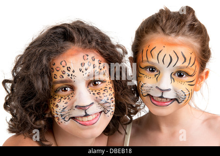 De belles jeunes filles avec feline visages peints, Tiger et Leopard Banque D'Images