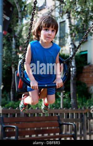 Quatre ans sur swing. Banque D'Images