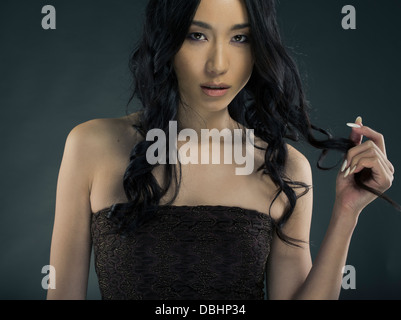 Belle femme asiatique d'une vingtaine Banque D'Images