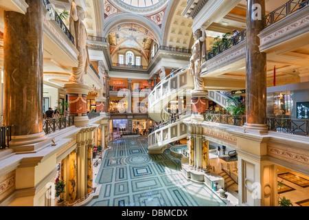 Caesar's Palace Las Vegas shopping mall entrance with spiral people carrier  stair and statues Stock Photo - Alamy