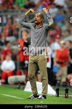 Munich, Allemagne. 06Th Aug 2013. Headcoach de Munich Pep Guardiola réagit au cours de l'Audi Cup soccer match final FC Bayern Munich vs Manchester City FC à l'Allianz Arena de Munich, Allemagne, 01 août 2013. Photo : Andreas Gebert/dpa/Alamy Live News Banque D'Images