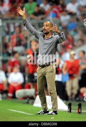 Munich, Allemagne. 06Th Aug 2013. Headcoach de Munich Pep Guardiola réagit au cours de l'Audi Cup soccer match final FC Bayern Munich vs Manchester City FC à l'Allianz Arena de Munich, Allemagne, 01 août 2013. Photo : Andreas Gebert/dpa/Alamy Live News Banque D'Images