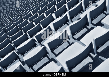 Résumé détail de l'arène sportive avec les pistes de course bleu Banque D'Images