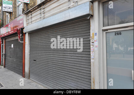 Green Lanes, London, UK. 6 août 2013. Boutiques vides sur les Green Lanes, Haringey. Il y a 7 000 magasins de Londres vide, coûtant £350m de baisse du chiffre d'affaires. Crédit : Matthieu Chattle/Alamy Live News Banque D'Images