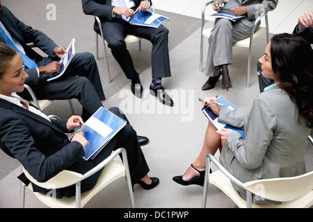 High angle view of business people in circle Banque D'Images