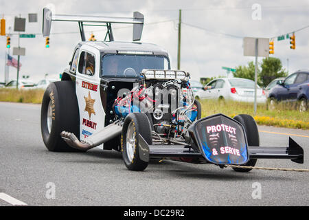 Concord, Caroline du Nord, USA. 07Th Aug 2013. Poursuite extrême fait son chemin vers le bas Bruton Smith Blvd à Concord, NC lors de la Parade 2013 de pouvoir le mercredi 07 août, 2013. L'événement est devenu un événement annuel pour lancer le début de l'automne saison de course à Charlotte Motor Speedway, à Concord. Crédit : Christopher Kimball/Alamy Live News Banque D'Images