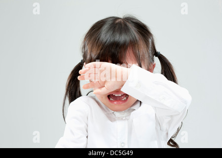 Gros plan d'une jeune fille pleurer Banque D'Images
