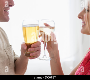 Close-up of couple drinking toast Banque D'Images