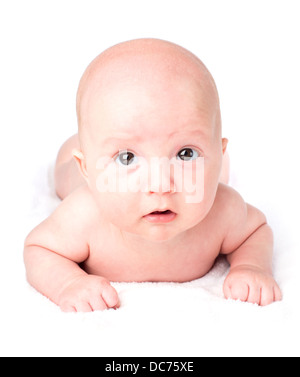 Cute baby lying on towel Banque D'Images