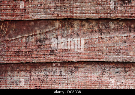 La texture du bois, avec look vieilli, vieille et rouge foncé - Vintage Banque D'Images