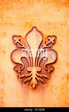 Fleur de lis de Florence sur une plaque de métal Banque D'Images