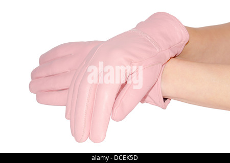 Mains gracieuses dans le cuir des gants roses isolated on white Banque D'Images