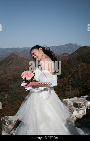 Bride sur la Grande Muraille de Chine, à Simatai. Banque D'Images