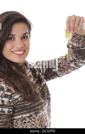 Parution du modèle. happy young woman holding house keys Banque D'Images