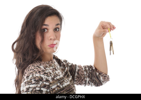 Parution du modèle. sad young woman holding house keys Banque D'Images