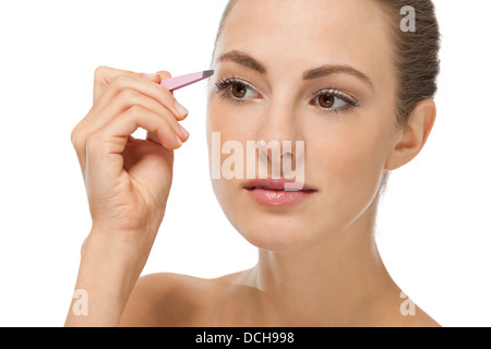 Belle jeune femme et sourcils épiler isolated on white Banque D'Images