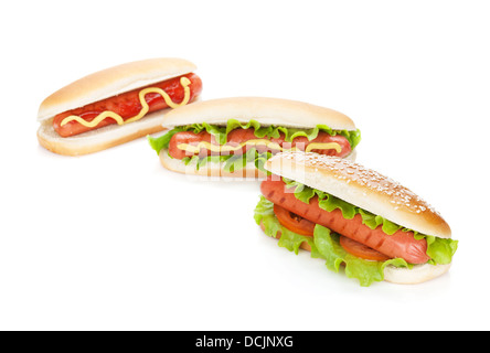 Trois hot-dogs avec divers ingrédients. Isolé sur fond blanc Banque D'Images