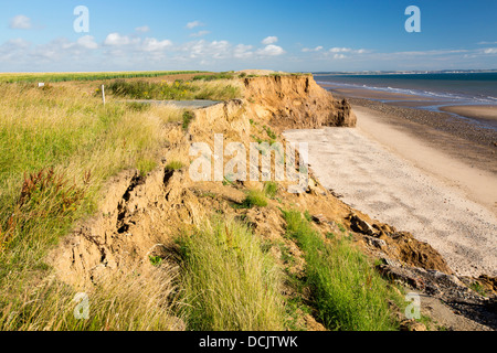 Une route côtière à Skipsea Ulrome entre et sur la côte Est, près de Yorkshires Skipsea, UK. Banque D'Images