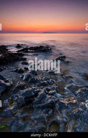 Le lever du soleil sur la mer d'Irlande à Malahide, République d'Irlande Banque D'Images