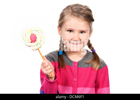 Cute girl with lollipop isolé sur fond blanc Banque D'Images