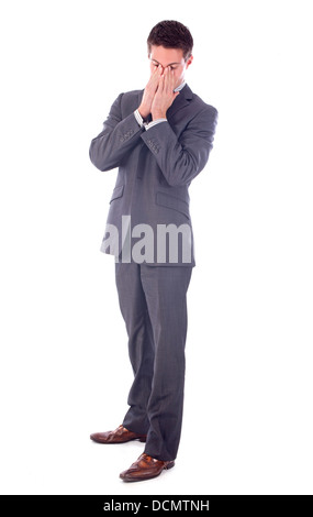 Jeune homme d'affaires inquiets in front of white background Banque D'Images