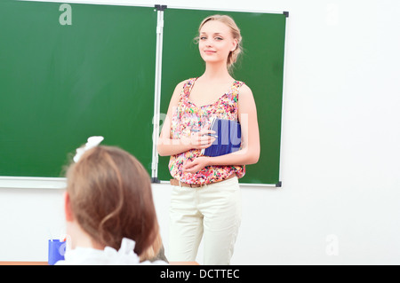 Enseignant et élèves en classe Banque D'Images