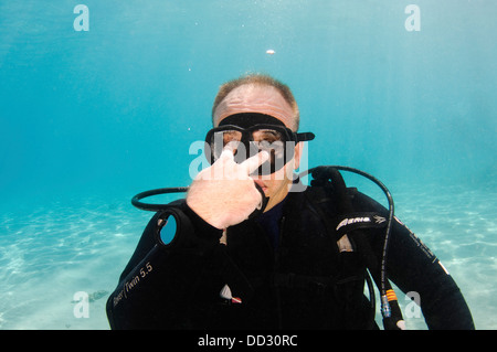 Signes de la main sous l'eau Banque D'Images