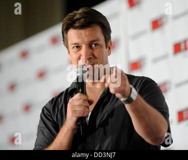 Toronto, ON. Août 25, 2013. Nathan Fillion lors d'une comparution dans le cadre de la FAN EXPO CANADA - Jour 2 SUN, Metro Toronto Convention Centre, Toronto, le 25 août 2013. Credit : Nicole Springer/Everett Collection/Alamy Live News Banque D'Images