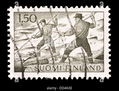 Timbre-poste de Finlande représentant log flottant dans l'industrie du bois, Banque D'Images