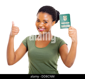 Cheerful young black girl avec l'identité de l'Afrique du Sud document giving thumb up Banque D'Images