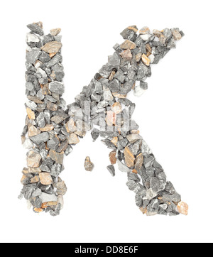 K - alphabet de pierre sur blanc. Banque D'Images