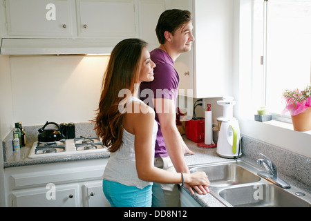 Woman in kitchen Banque D'Images