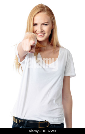 Happy woman pointing at le spectateur avec un beau sourire amical, isolated on white Banque D'Images