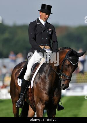 Stamford, Angleterre . Le 05 août, 2013. Andrew Nicholson [USA] cheval CALICO JOE durant la phase de dressage le jour 1 de la Land Rover Burghley Horse Trials. La Land Rover Burghley Horse Trials ont lieu entre 5 et 8 septembre à Burghley House,© Stephen Bartholomew/Alamy Live News Crédit : Stephen Bartholomew/Alamy Live News Banque D'Images