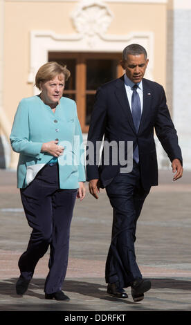 Saint-pétersbourg, Russie. Le 06 août, 2013. La chancelière allemande, Angela Merkel, et le président américain Barack Obama à pied à côté de l'autre au sommet du G20 à Saint-Pétersbourg, Russie, 06 septembre 2013. Le sommet du G20 aura lieu du 05 au 06 septembre. Photo : Kay Nietfeld/dpa/Alamy Live News Banque D'Images