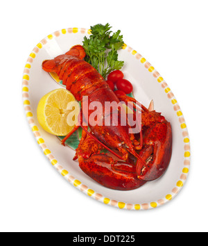 Red Lobster avec citron et persil sur fond blanc Banque D'Images