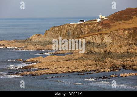 Phare sur Bull Point, vu à travers la baie de Rockham, nr Mortehoe Woolacombe, nr, Devon, Grande Bretagne. Banque D'Images