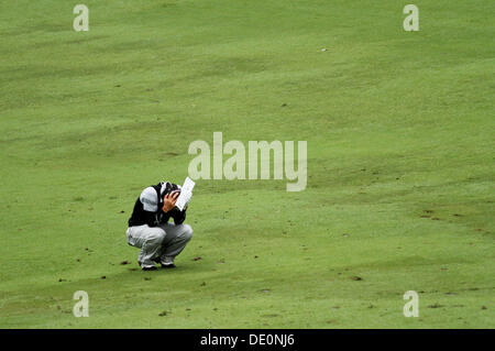 Greensboro, North Carolina, USA. Août 17, 2013. Ryo Ishikawa (JPN) Golf : Ryo Ishikawa du Japon a l'air abattu au cours de la troisième série de l'Wyndham Championship à Sedgefield Country Club à Greensboro, North Carolina, United States . © Yasuhiro JJ Tanabe/AFLO/Alamy Live News Banque D'Images