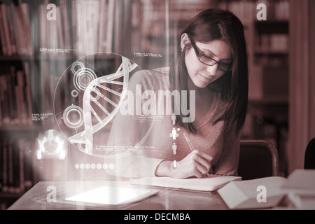 Concentrated mature student studying medicine on digital interface Banque D'Images