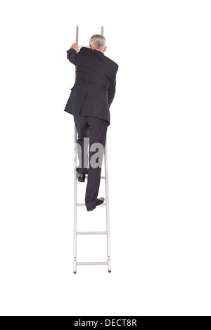 Businessman climbing career ladder Banque D'Images