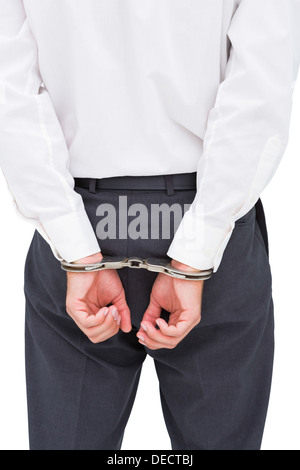 Close up on young businessman wearing handcuffs Banque D'Images
