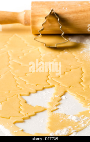 La pâte à biscuits de Noël les desserts au rouleau à pâtisserie et de la faucheuse Banque D'Images