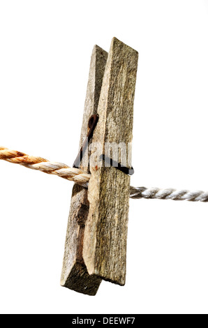 Vêtements anciens en bois peg sur une corde Banque D'Images