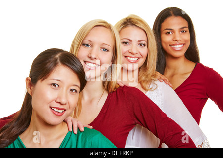 Groupe de quatre happy women standing in a row Banque D'Images