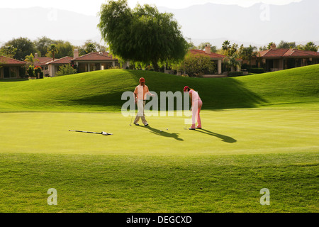 Deux chinois en jouant au golf Banque D'Images