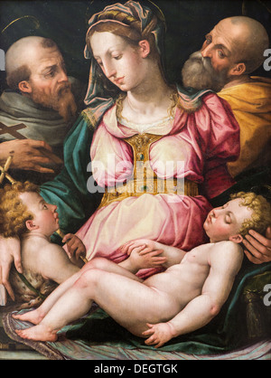 16e siècle - Sainte Famille avec le jeune Saint Jean-Baptiste et Saint François d'Assise, vers 1550 - Giorgio Vasari Banque D'Images