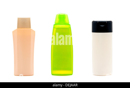 Trois flacons cosmétiques blanc isolé sur fond blanc Banque D'Images