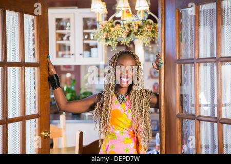 African American Woman standing in doorway Banque D'Images
