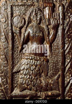 Zennor Mermaid légende : sculpture d'une sirène avec un peigne et miroir sur un banc du 15e siècle-fin dans l'église St Senara, Zennor, Cornwall. Banque D'Images